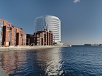 White tower by the water